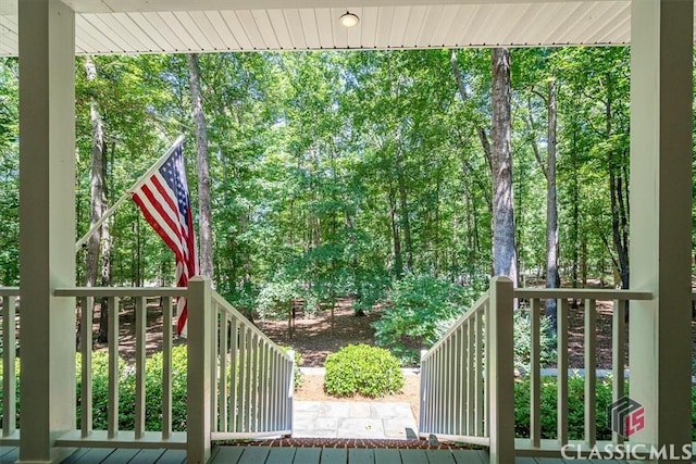 wooden balcony featuring a wooden deck