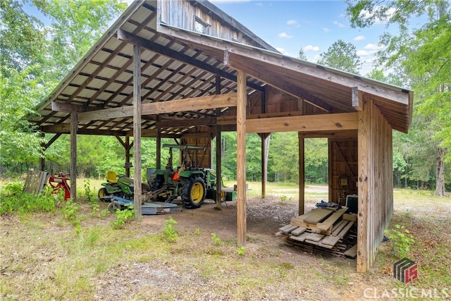 view of community featuring an outbuilding and a carport