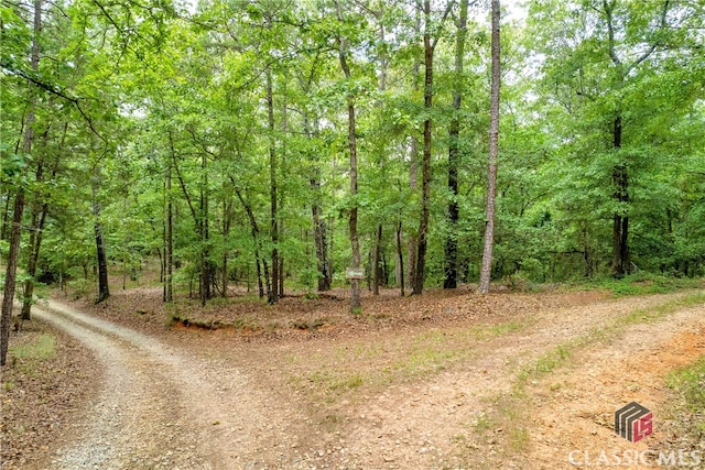 view of street featuring a view of trees