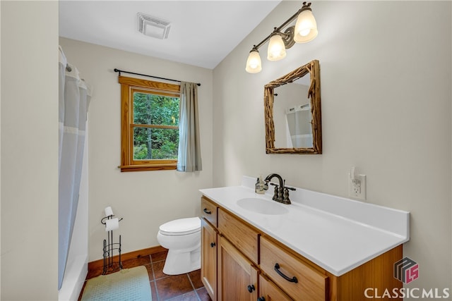 full bathroom featuring tile patterned flooring, toilet, vanity, baseboards, and visible vents