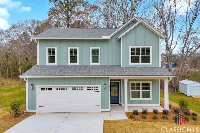 view of front of house with a front lawn and a garage