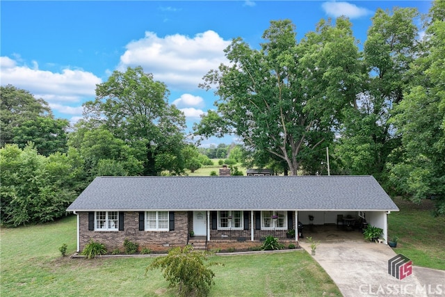 ranch-style house with a carport and a front yard