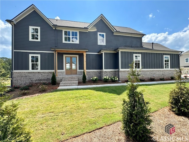 view of front of home with a front lawn