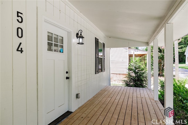 wooden deck featuring a porch