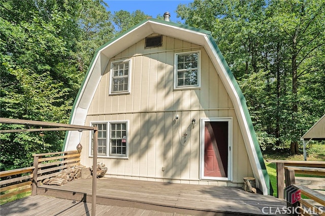 view of side of property with a deck