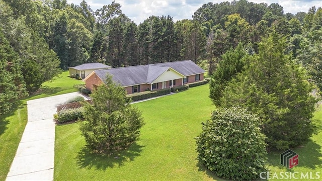 aerial view featuring a view of trees