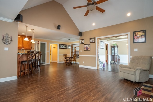 living room featuring ornamental molding, high vaulted ceiling, ceiling fan, and dark hardwood / wood-style floors