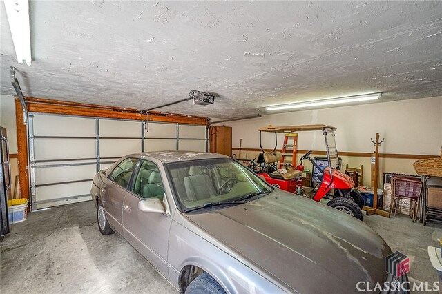 garage with a garage door opener