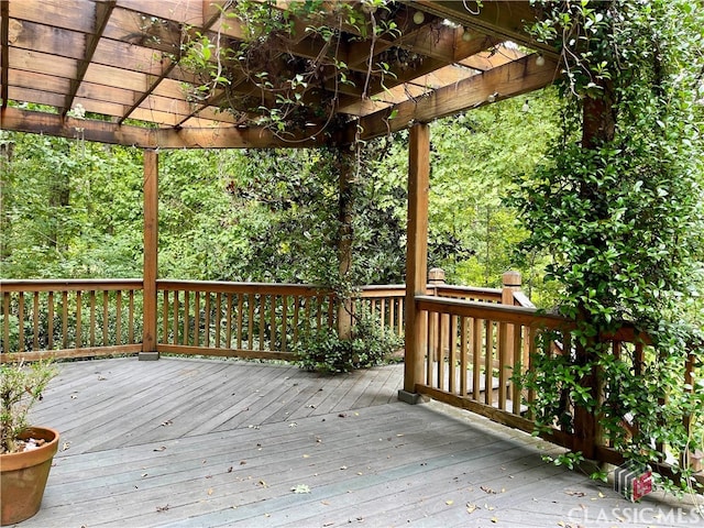 wooden terrace featuring a pergola