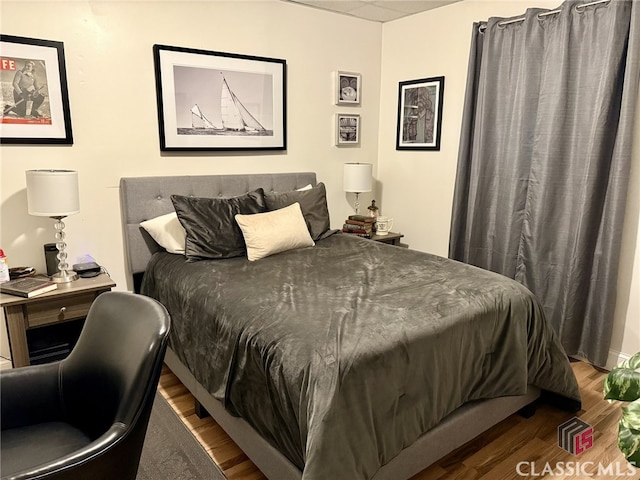 bedroom featuring hardwood / wood-style floors