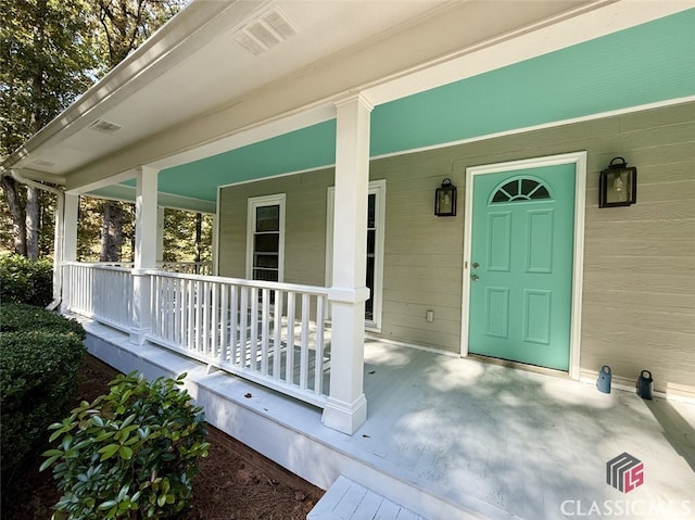 property entrance with a porch