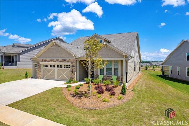 craftsman house with a garage and a front lawn