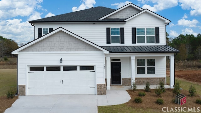 craftsman inspired home with a porch and a garage