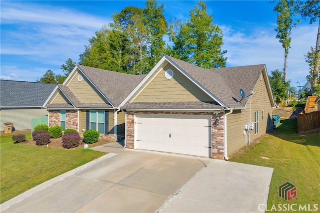 view of front of home featuring a front lawn and a garage