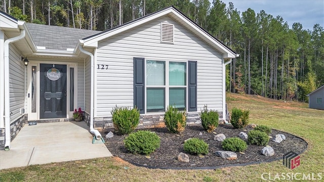 exterior space with a front lawn