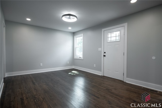 entrance foyer featuring dark hardwood / wood-style floors