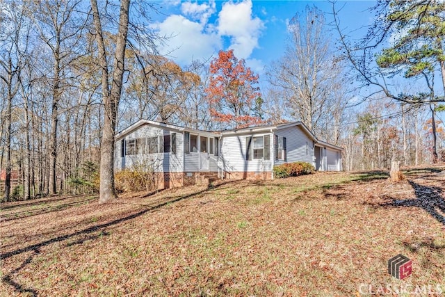 view of front of home featuring a garage