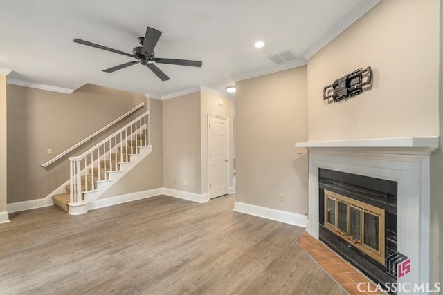 unfurnished living room with wood-type flooring, ceiling fan, and crown molding