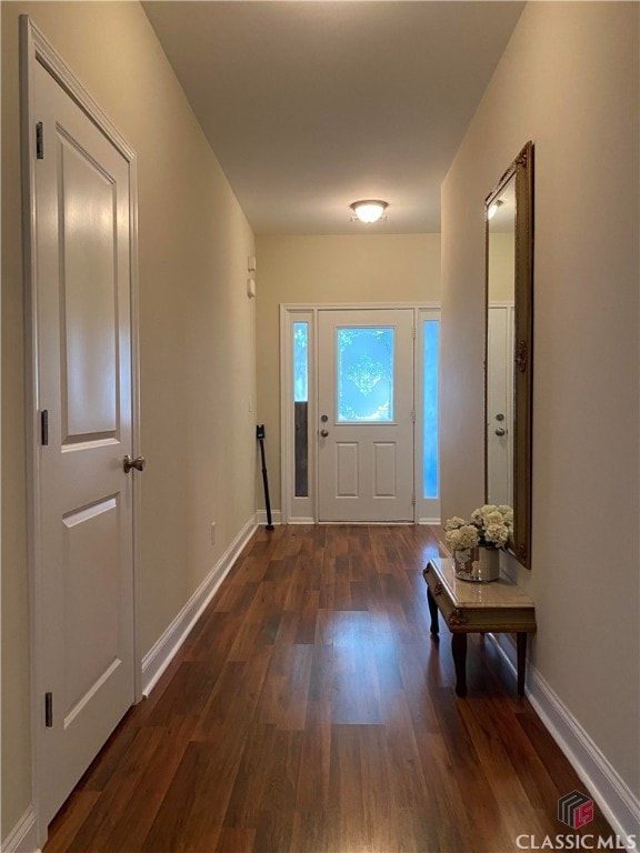 doorway featuring dark hardwood / wood-style floors