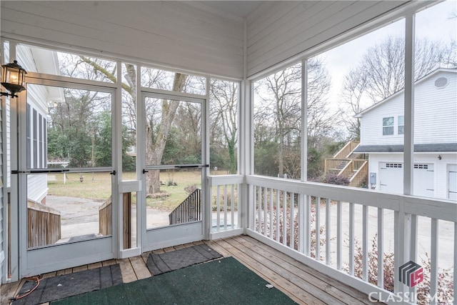 dining space featuring a healthy amount of sunlight, light hardwood / wood-style floors, and crown molding