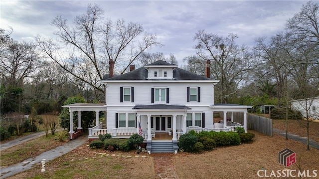 country-style home featuring a porch