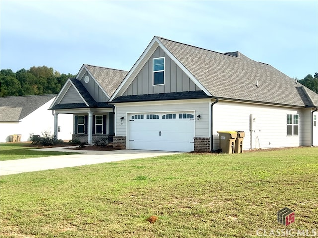 craftsman-style home featuring a garage and a front yard