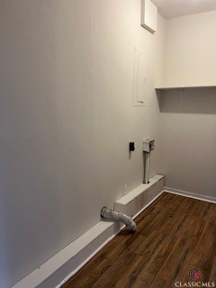 laundry room with dark wood-type flooring