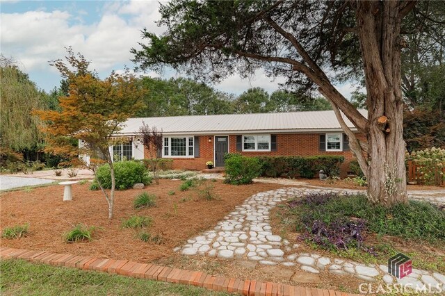 1471 Lenru Rd, Bogart, GA 30622 - single story home featuring metal roof and brick siding