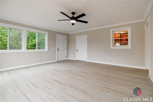 1471 Lenru Rd, Bogart, GA 30622 - unfurnished room featuring ornamental molding, ceiling fan, wood finished floors, and baseboards