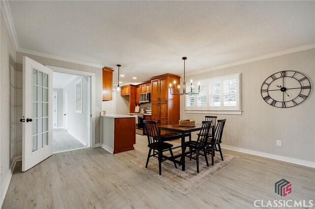 1471 Lenru Rd, Bogart, GA 30622 - dining room with a chandelier, light wood finished floors, and ornamental molding