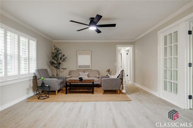 1471 Lenru Rd, Bogart, GA 30622 - living area featuring wood finished floors, baseboards, and ornamental molding