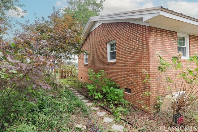 1471 Lenru Rd, Bogart, GA 30622 - view of side of home featuring brick siding
