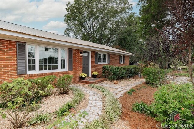 1471 Lenru Rd, Bogart, GA 30622 - single story home featuring brick siding and metal roof