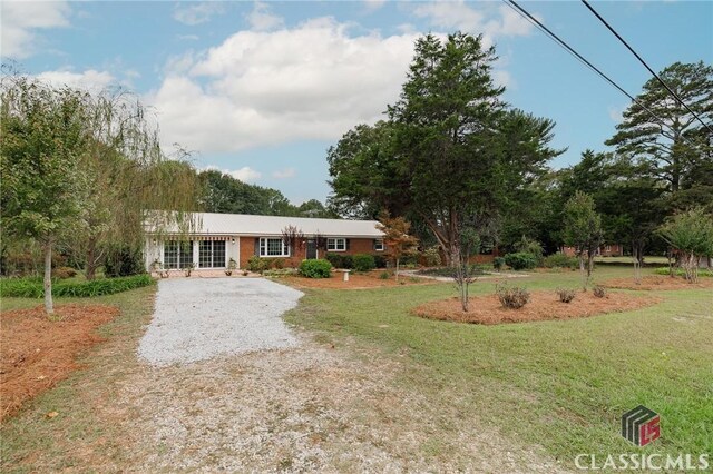 1471 Lenru Rd, Bogart, GA 30622 - ranch-style house featuring a front yard and driveway