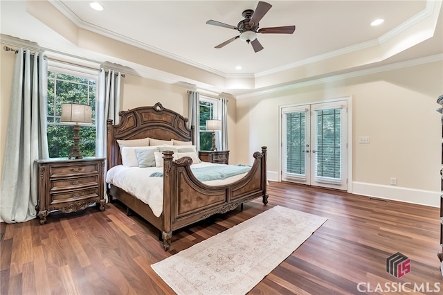 bedroom with multiple windows, ceiling fan, crown molding, and dark hardwood / wood-style flooring