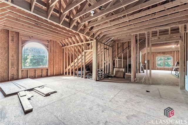 misc room featuring vaulted ceiling and a wealth of natural light