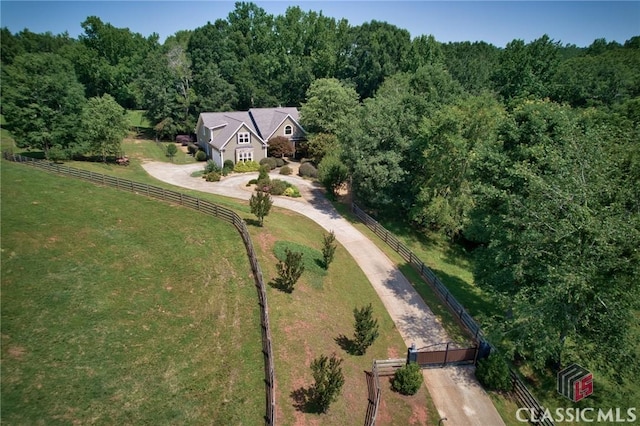 drone / aerial view with a view of trees