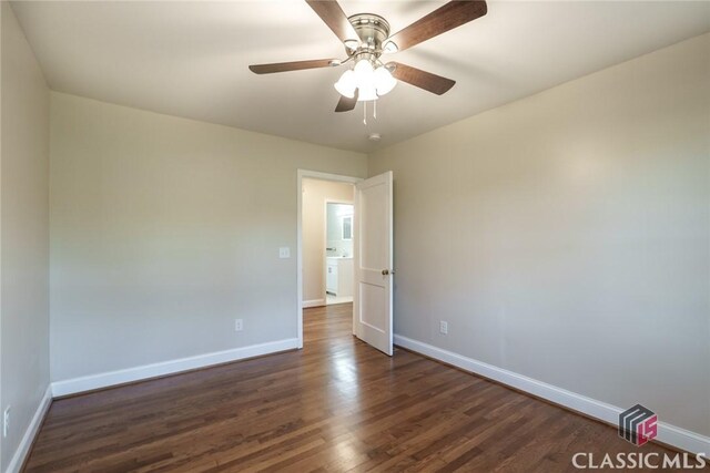 218 E Vine St, Monroe, GA 30655 - unfurnished room featuring dark wood-type flooring, baseboards, and a ceiling fan