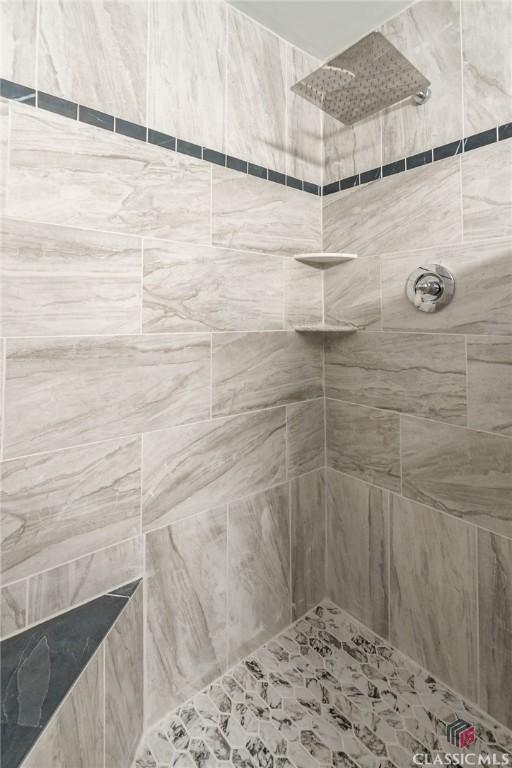 218 E Vine St, Monroe, GA 30655 - full bathroom with tiled shower
