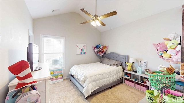 bedroom with ceiling fan, lofted ceiling, visible vents, and light carpet