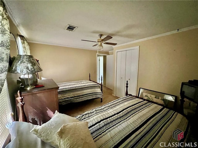 384 Arrowhead Trl Unit 4, Eatonton, GA 31024 - carpeted bedroom with ceiling fan, crown molding, a closet, and visible vents