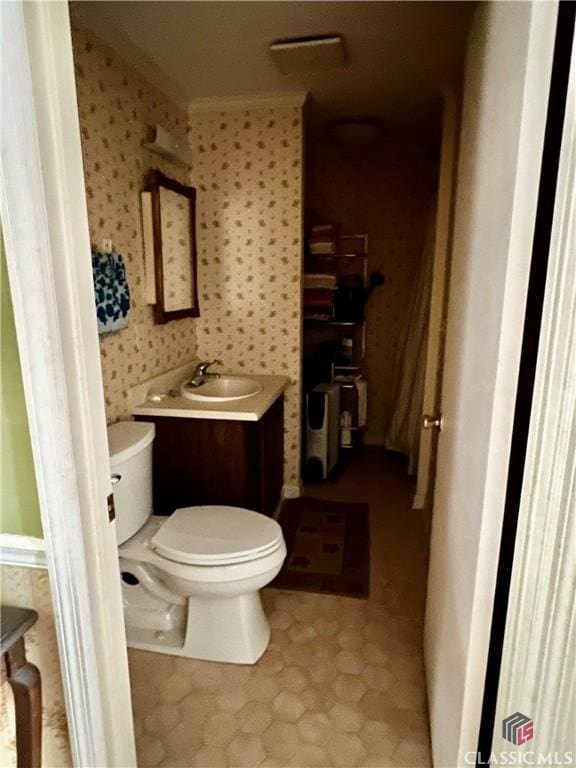 384 Arrowhead Trl Unit 4, Eatonton, GA 31024 - bathroom featuring toilet and vanity