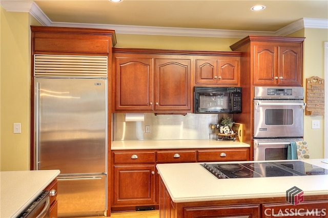 kitchen with decorative backsplash, ornamental molding, and black appliances