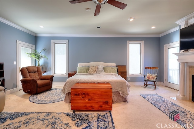 bedroom with crown molding, light colored carpet, access to outside, and ceiling fan