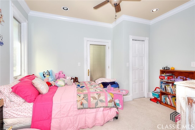 bedroom with ornamental molding, carpet floors, and ceiling fan