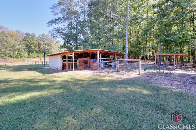 exterior space featuring an outbuilding