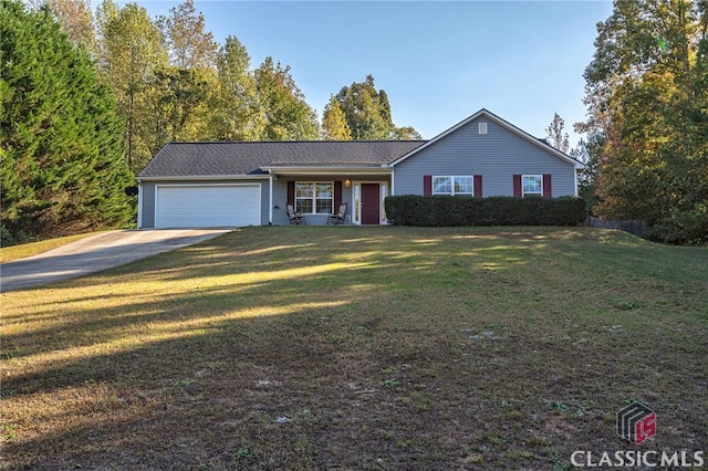 single story home with a front lawn and a garage