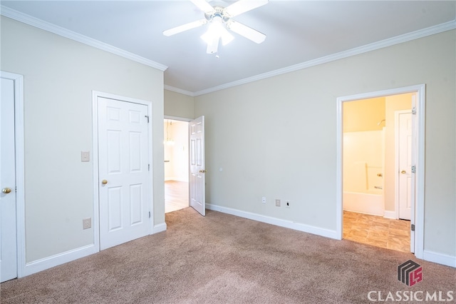 unfurnished bedroom featuring light carpet, ceiling fan, and crown molding