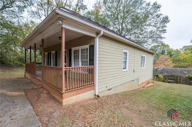 view of home's exterior with a yard