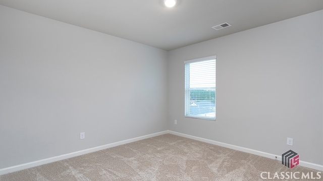 empty room with carpet floors